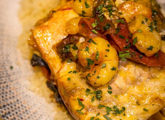 Lubina a la plancha con gambas, salsa dorada especiada y cous cous - Al-Mounia Madrid